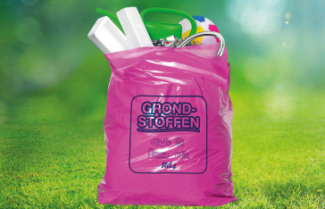 Afbeelding met gras liggend